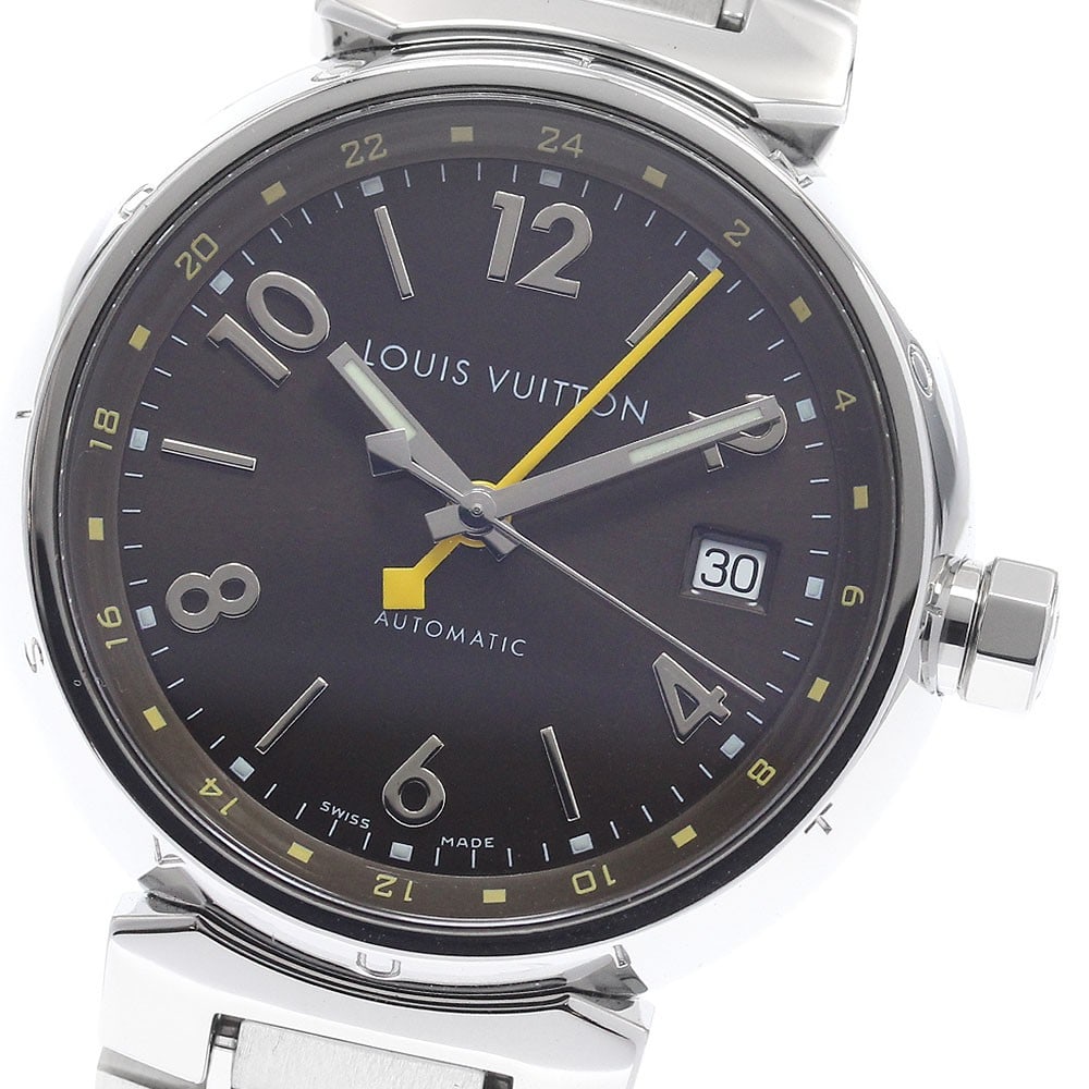Louis Vuitton Tambour Q1131 mens GMT date wristwatch: Louis Vuitton Tambour Q1131 mens GMT date wristwatch Louis Vuitton Tambour GMT Date men's wristwatch, pre-owned and offered as watch only with no accessories. It features a stainless steel case and ba