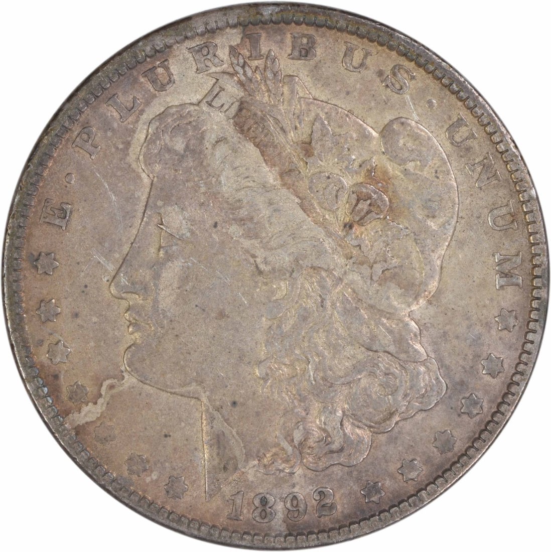 1892 Morgan Dollar Philadelphia 90 Percent Silver EF Grade Uncertified: 1892 Morgan Dollar Philadelphia 90 Percent Silver EF Grade Uncertified This 1892 Morgan Silver Dollar from the Philadelphia Mint is composed of 90% silver and 10% copper. Designed by George T. Morgan,