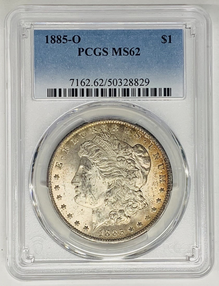 PCGS MS62 1885-O Morgan Dollar Silver $1 Coin With Toning: PCGS MS62 1885-O Morgan Dollar Silver $1 Coin With Toning This is a toned 1885-O Morgan Silver Dollar coin from the United States, graded MS 62 by PCGS. The coin is composed of silver, is uncirculated