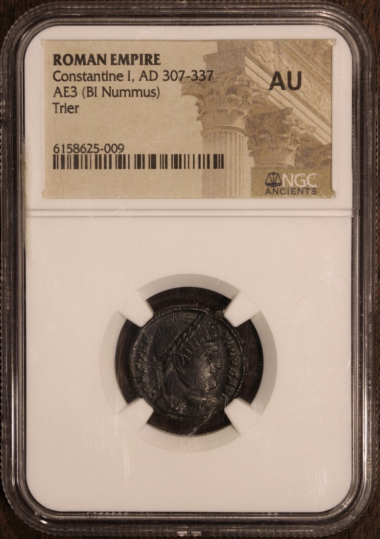 Constantine I Nummus Coin 337 AD NGC AU Billon: Constantine I Nummus Coin 337 AD NGC AU Billon This ancient coin features Emperor Constantine I the Great, who ruled from AD 307 to 337. Struck in billon, this Nummus dates back to 337 AD and is part 