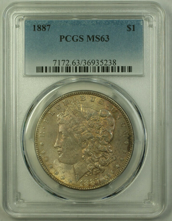 PCGS MS63 1887 Morgan Dollar Silver Coin with Toning: PCGS MS63 1887 Morgan Dollar Silver Coin with Toning This 1887 Morgan Silver Dollar is an uncirculated $1 coin certified by PCGS with a grade of MS-63. The coin features attractive overall toning and 