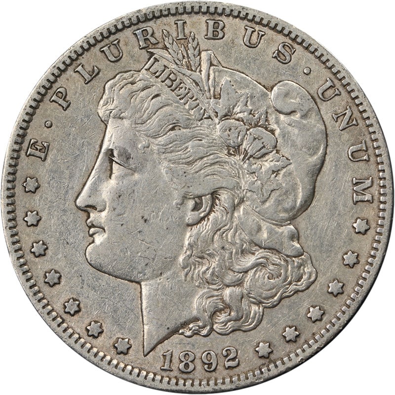 1892-S Morgan Dollar Choice VF XF Silver: 1892-S Morgan Dollar Choice VF XF Silver This 1892-S Morgan Silver Dollar is a circulated coin from the United States, featuring a strong strike and attractive surfaces. Graded as Choice VF/XF, it dis