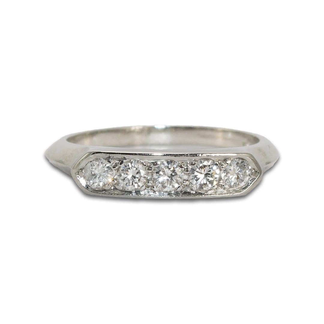 Unbranded Platinum Ring with 5 Round Brilliant Diamonds 0.25 ctw: Unbranded Platinum Ring with 5 Round Brilliant Diamonds 0.25 ctw Pre-owned ladies platinum ring set with five natural round brilliant diamonds. The diamonds have a total weight of approximately 0.25 c