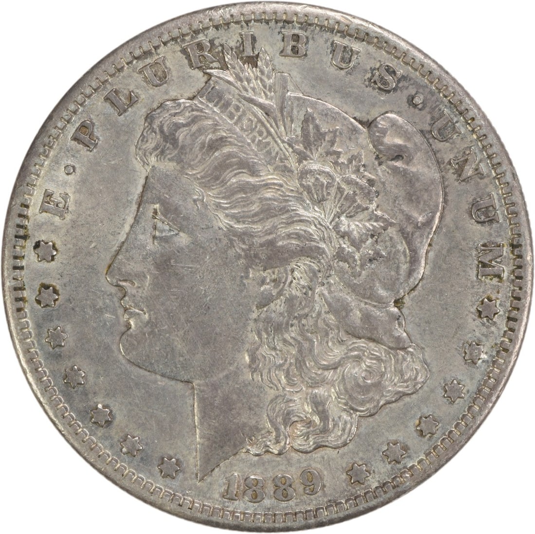 1889-O Morgan Silver Dollar EF Uncertified New Orleans Mint: 1889-O Morgan Silver Dollar EF Uncertified New Orleans Mint This 1889-O Morgan Silver Dollar is a historic coin featuring the graceful design of George T. Morgan. Struck in New Orleans, this coin is c