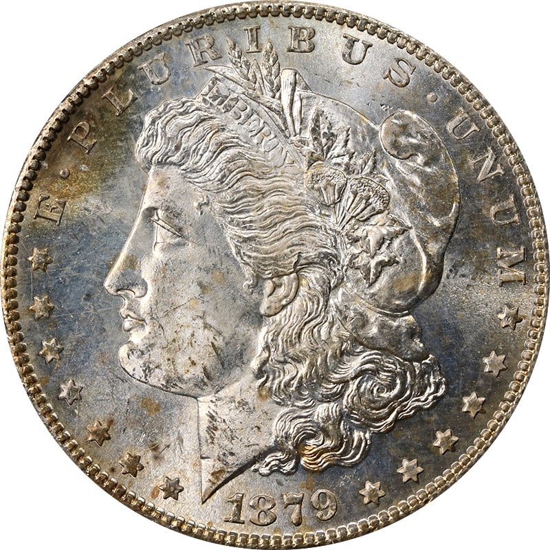 PCGS MS64 1879-S Morgan Silver Dollar OGH Silver Coin: PCGS MS64 1879-S Morgan Silver Dollar OGH Silver Coin 1879-S Morgan Silver Dollar in PCGS MS64 grade, housed in an OGH holder and noted with toning. The coin is uncirculated, composed of silver, and i