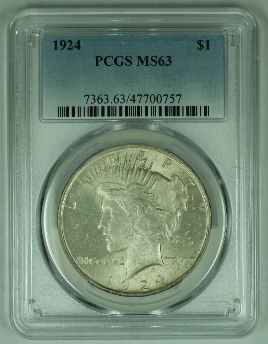 PCGS MS 63 Certified 1924 Silver Peace Dollar Coin United States: PCGS MS 63 Certified 1924 Silver Peace Dollar Coin United States This 1924 Peace Silver Dollar is an uncirculated coin from the United States, graded MS 63 by PCGS. Composed of silver, this collectibl