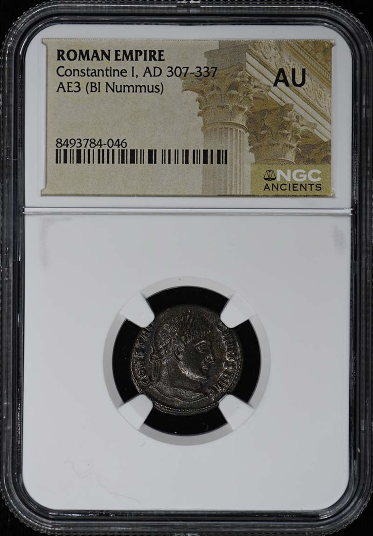 NGC AU Constantine I Roman AE3 BI Nummus: NGC AU Constantine I Roman AE3 BI Nummus This is a Roman Empire AE3 (BI Nummus) coin from the reign of Constantine I, dated AD 307-337. The coin has been certified and graded AU by NGC, indicating it 