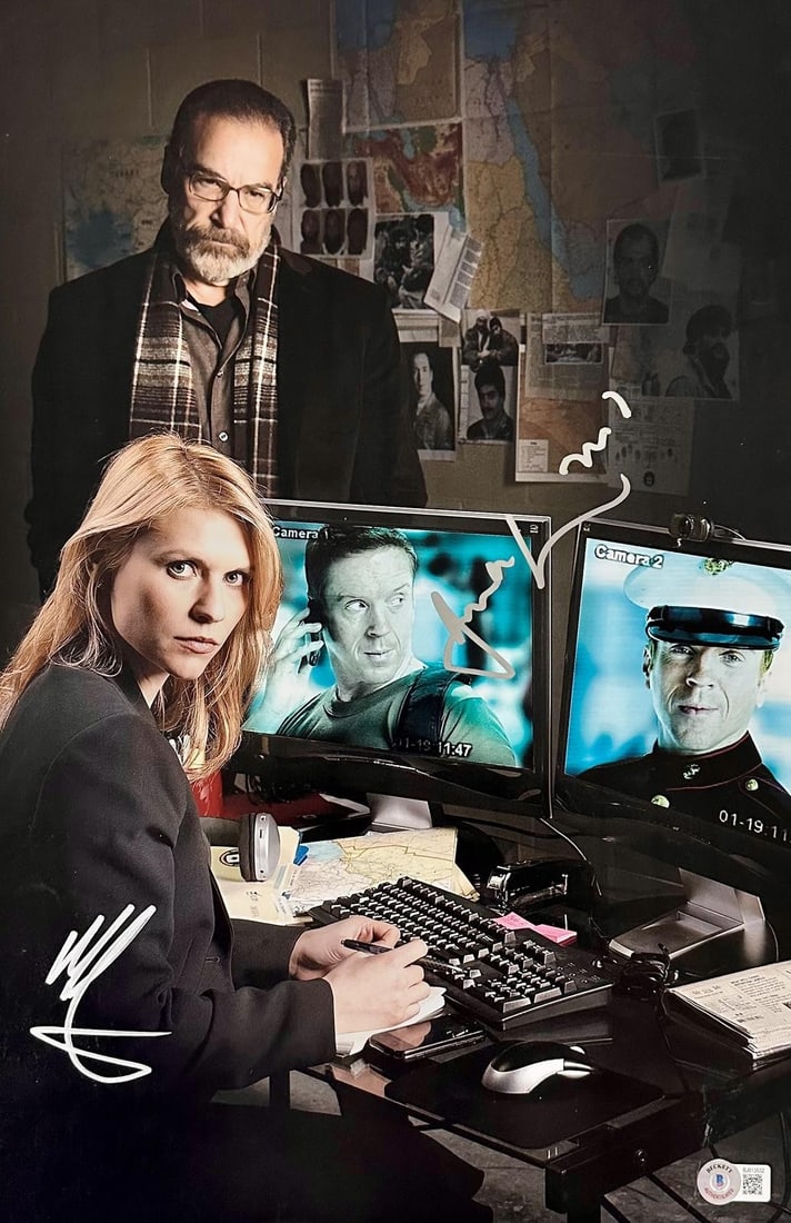 Homeland 12x18 photo signed by Damian Lewis and Claire Danes Beckett: Homeland 12x18 photo signed by Damian Lewis and Claire Danes Beckett This 12x18 photograph from the television drama Homeland features the authentic signatures of Damian Lewis and Claire Danes. The ph