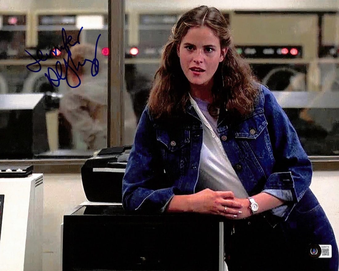 11x14 Ally Sheedy autographed WarGames photo Beckett authenticated: 11x14 Ally Sheedy autographed WarGames photo Beckett authenticated This 11x14 color photograph features a bold blue ink signature and the inscription "Jennifer" by actress Ally Sheedy. The autograph i