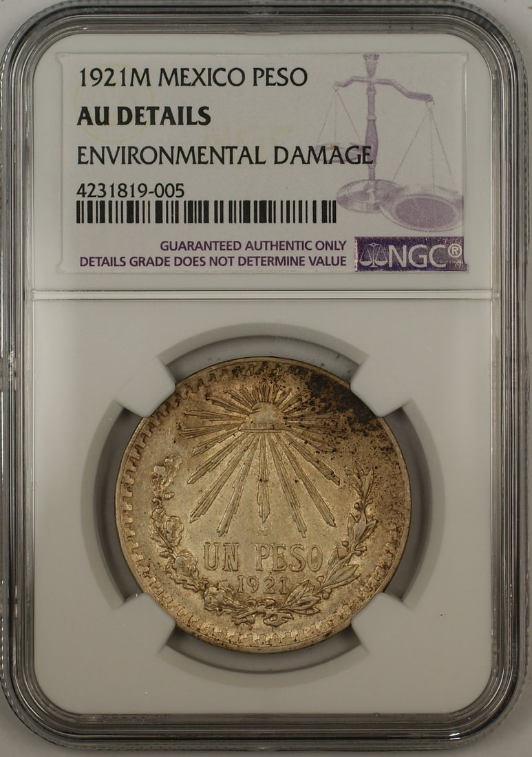 NGC AU Details 1921-M Silver 1 Peso Coin from Mexico with Environmental Damage: NGC AU Details 1921-M Silver 1 Peso Coin from Mexico with Environmental Damage This 1921-M Mexico 1 Peso silver coin is certified by NGC with AU Details and displays environmental damage. It originate