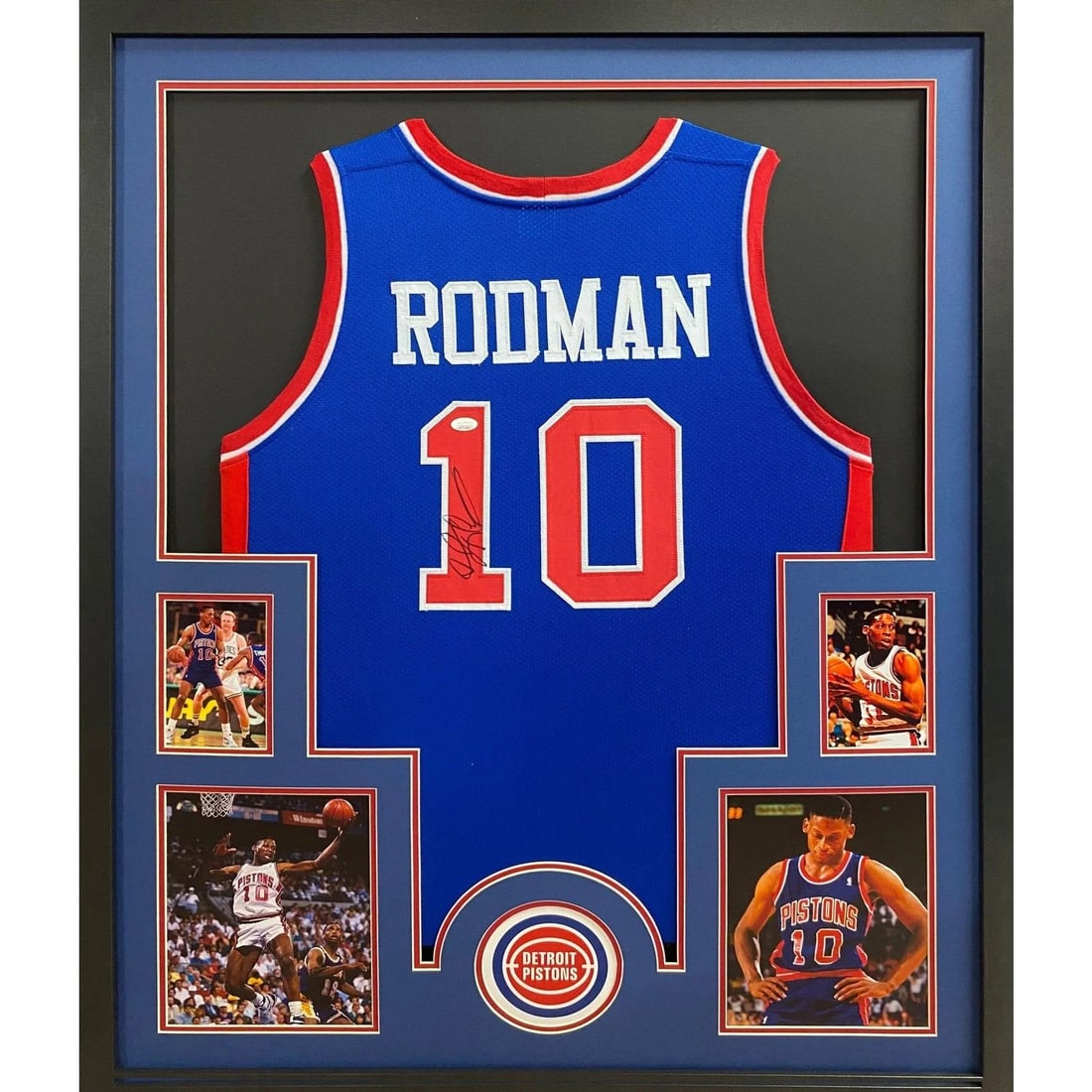 Dennis Rodman Autographed Framed Jersey Detroit Pistons JSA Certified: Dennis Rodman Autographed Framed Jersey Detroit Pistons JSA Certified This is a signed and framed blue jersey of Dennis Rodman, featuring the iconic logo of the Detroit Pistons. The jersey is authenti