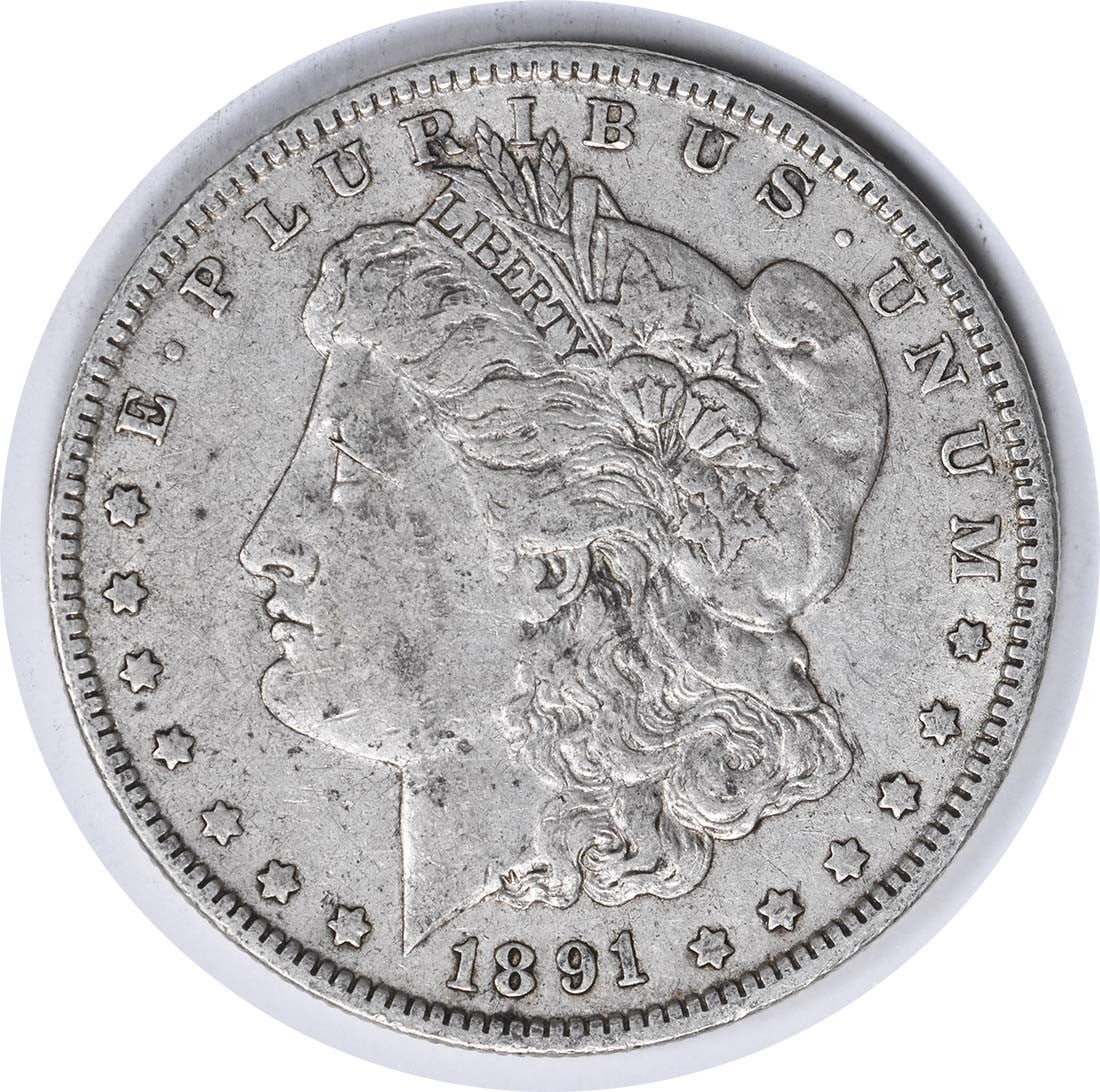 1891-O Morgan Silver Dollar XF Uncertified New Orleans Mint: 1891-O Morgan Silver Dollar XF Uncertified New Orleans Mint This 1891-O Morgan Silver Dollar is a circulated coin featuring a striking design by George T. Morgan. Made of 90% silver and 10% copper, th