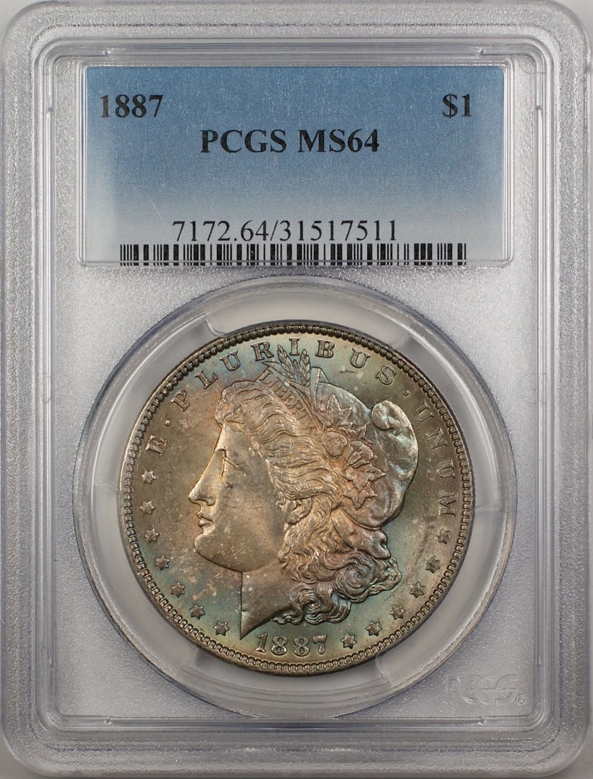 PCGS MS64 1887 Toned Morgan Dollar Silver Coin Philadelphia Mint: PCGS MS64 1887 Toned Morgan Dollar Silver Coin Philadelphia Mint This 1887 Morgan Silver Dollar features a PCGS certification with an MS-64 grade, indicating a high-quality, uncirculated coin. Minted 