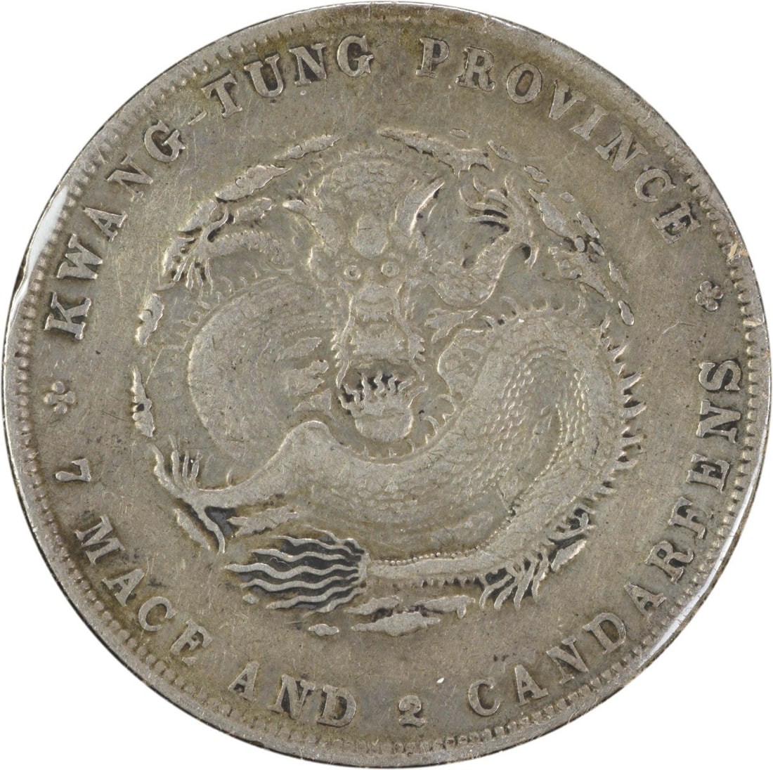 China Kwangtung 1 Dollar Silver Coin KMY203 Uncertified: China Kwangtung 1 Dollar Silver Coin KMY203 Uncertified This is a China Kwangtung 1 Dollar coin from the years 1890 to 1908, identified by KM number Y203. The coin is made of silver and is in Fine (F)