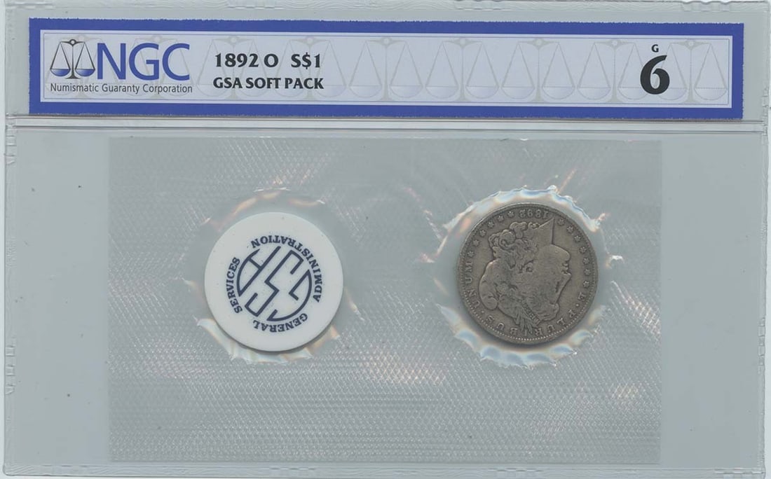 1892-O Morgan Silver Dollar GSA Soft Pack NGC Graded G6: 1892-O Morgan Silver Dollar GSA Soft Pack NGC Graded G6 This is a 1892-O Morgan Silver Dollar from the New Orleans Mint, certified by NGC with a grade of G6. The coin is circulated and comes in a GSA 