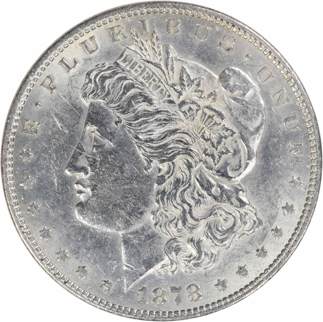1878 Morgan Dollar 7 Over 8 Tailfeathers AU Uncertified Philadelphia Mint: 1878 Morgan Dollar 7 Over 8 Tailfeathers AU Uncertified Philadelphia Mint This 1878 Morgan Silver Dollar features the 7/8 tail feathers variety and was minted in Philadelphia. Composed of 90% silver a