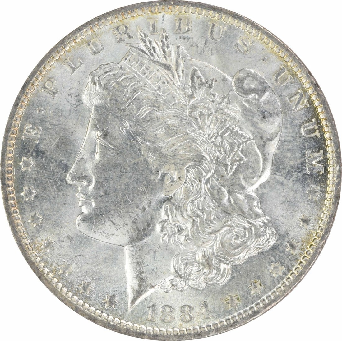 1884 O Morgan Silver Dollar $1 Uncirculated Silver Coin: 1884 O Morgan Silver Dollar $1 Uncirculated Silver Coin 1884-O Morgan Silver Dollar in uncirculated, pre-owned condition. This uncertified coin is composed of silver and carries an assigned grade of M
