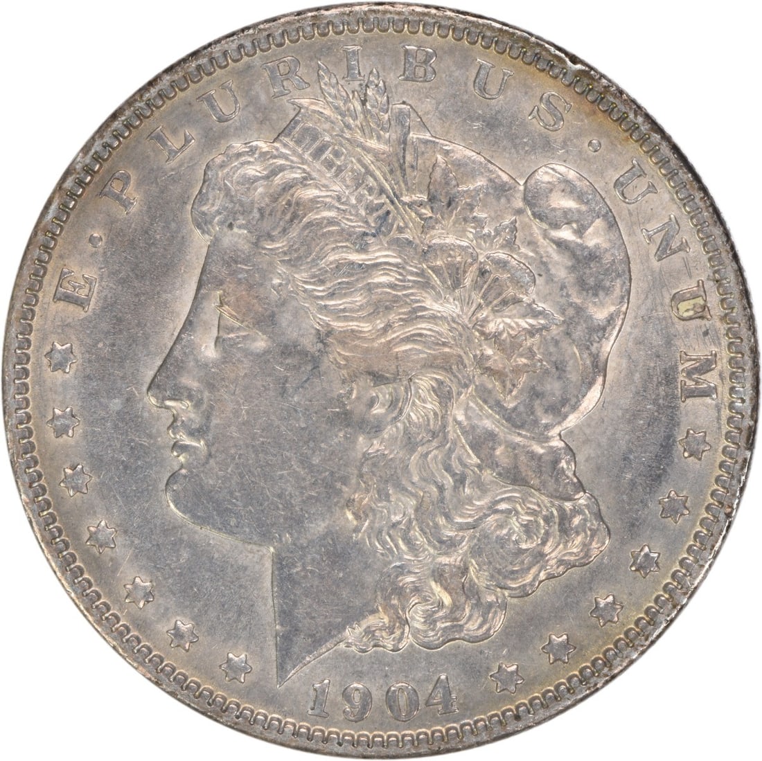 1904 Morgan Silver Dollar AU Uncertified 90% Silver Coin: 1904 Morgan Silver Dollar AU Uncertified 90% Silver Coin This 1904 Morgan Silver Dollar showcases a beautiful design by George T. Morgan. It is in AU (Almost Uncirculated) condition, indicative of its