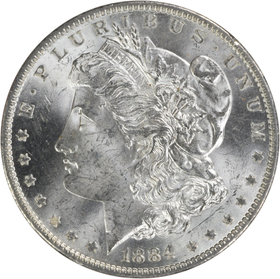 Uncertified 1884-O Silver Dollar Morgan Choice Brilliant Uncirculated: Uncertified 1884-O Silver Dollar Morgan Choice Brilliant Uncirculated This is an 1884-O Morgan Silver Dollar from the United States. The coin is uncirculated and graded as Choice BU. It features the N
