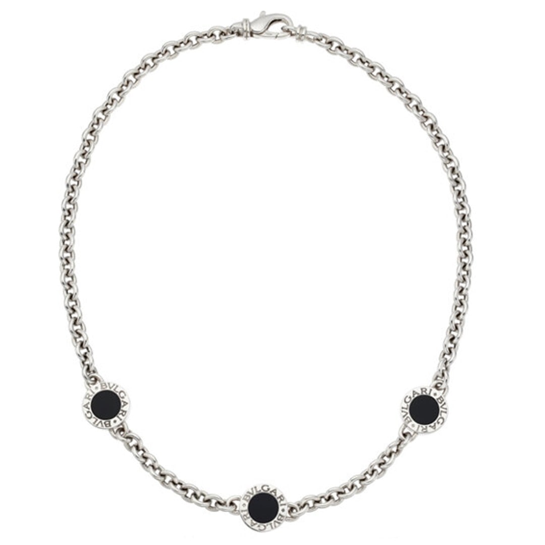 Bvlgari Bvlgari 18K White Gold Onyx Statement Necklace 15.5in: Bvlgari Bvlgari 18K White Gold Onyx Statement Necklace 15.5in Bvlgari Bvlgari statement necklace crafted in 18K white gold with carved black onyx. This pre-owned piece features a bold round design and