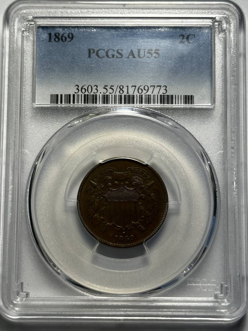 1869 Philadelphia 2C Copper Coin PCGS AU55 Brown: 1869 Philadelphia 2C Copper Coin PCGS AU55 Brown 1869 Philadelphia Two Cent piece certified by PCGS and graded AU 55 BN. This pre-owned coin is composed of copper and has a denomination of Cent. The c