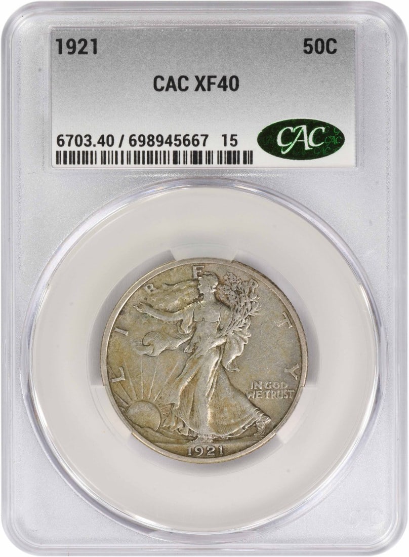 1921 Liberty Walking Half Dollar CACG Graded EF40 Philadelphia Mint: 1921 Liberty Walking Half Dollar CACG Graded EF40 Philadelphia Mint This 1921 Walking Liberty Silver Half Dollar from the Philadelphia Mint is certified by CACG and graded EF40. Designed by Adolph Ale