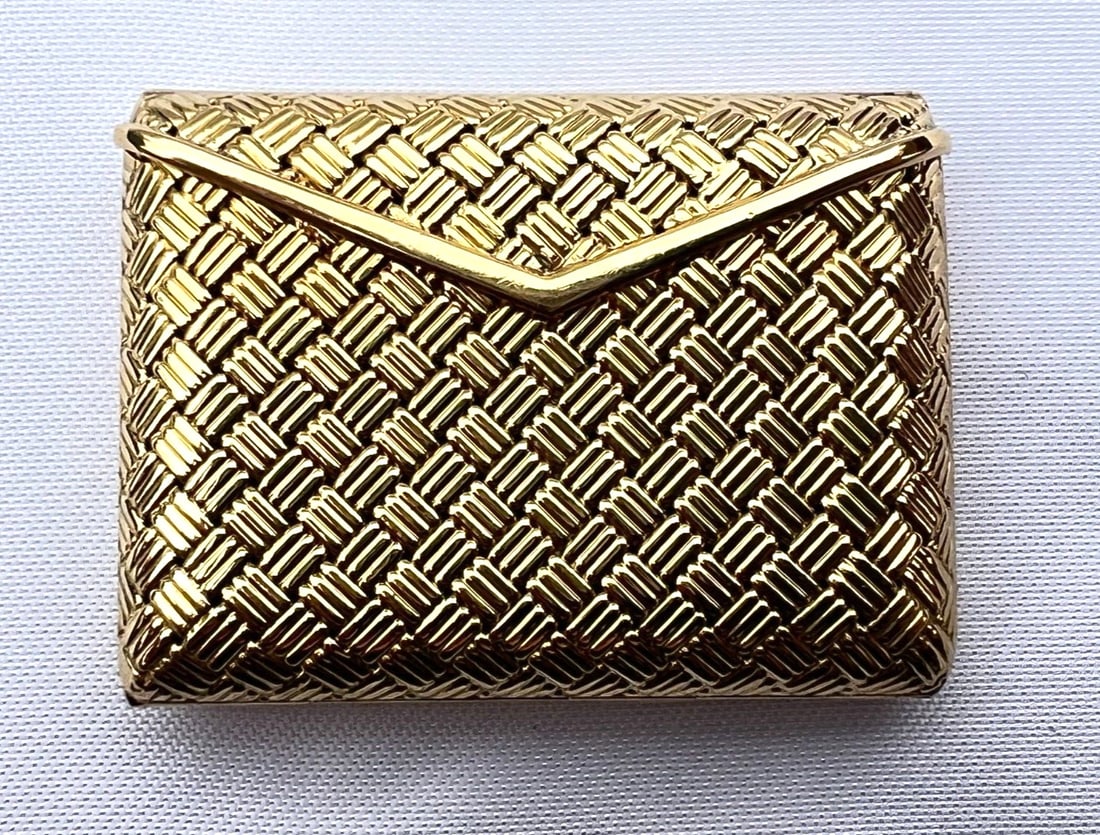 Piaget 18K Gold 1960s Travel Envelope Pocket Watch: Piaget 18K Gold 1960s Travel Envelope Pocket Watch Experience the elegance of this exquisite Piaget 18K gold travel envelope design pocket watch from the 1960s. This unique timepiece features a charmi