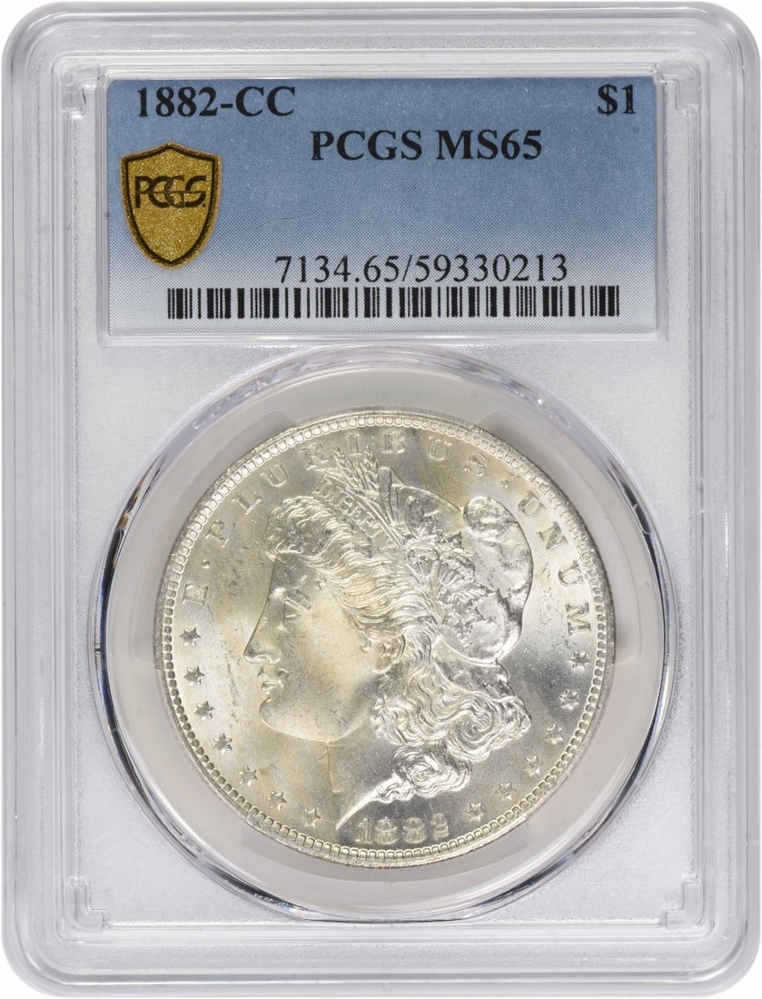 PCGS MS65 1882 CC Morgan Dollar: PCGS MS65 1882 CC Morgan Dollar This 1882-CC Morgan Silver Dollar is graded MS65 by PCGS, indicating its high-quality uncirculated condition. Minted in Carson City, this coin is composed of 90% silver