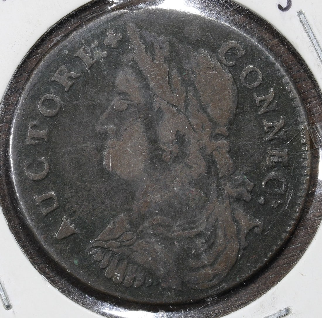 1787 Connecticut Copper Colonial Draped Bust Left Miller 19 VF: 1787 Connecticut Copper Colonial Draped Bust Left Miller 19 VF This 1787 Connecticut Copper features the Draped Bust Left design and is a colonial-era copper coin from the United States. The coin is i