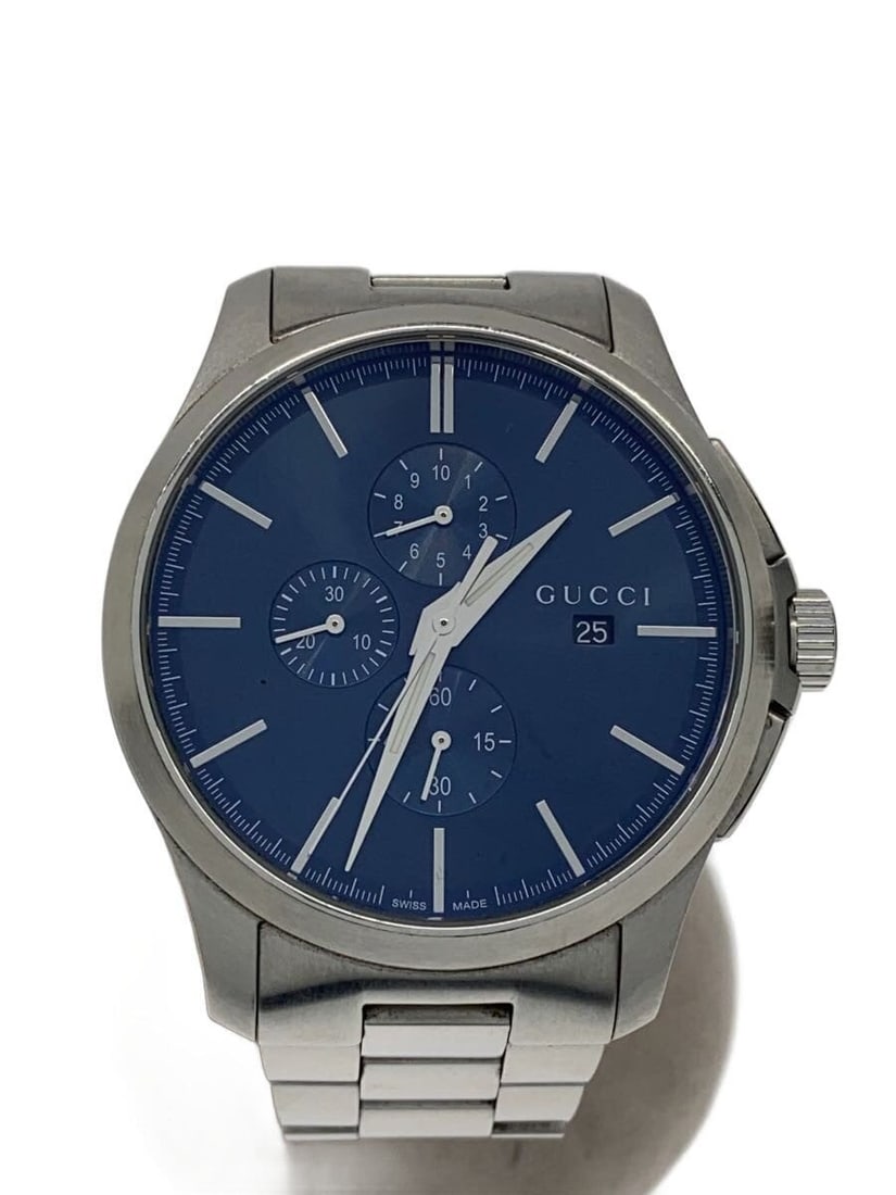 Gucci Timeless Quartz Blue Stainless Steel Men's Wristwatch: Gucci Timeless Quartz Blue Stainless Steel Men's Wristwatch This is a pre-owned GUCCI G-TIMELESS Quartz YA126273 men's wristwatch. Crafted in Switzerland, it features a blue dial with a stainless stee