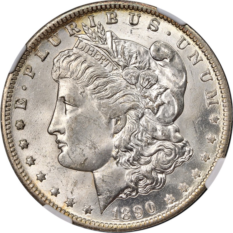 1890-O Morgan Silver Dollar NGC MS62 Uncirculated Silver Coin: 1890-O Morgan Silver Dollar NGC MS62 Uncirculated Silver Coin This 1890-O Morgan Silver Dollar is a stunning example of American numismatic history. Certified by NGC with a grade of MS62, it showcases