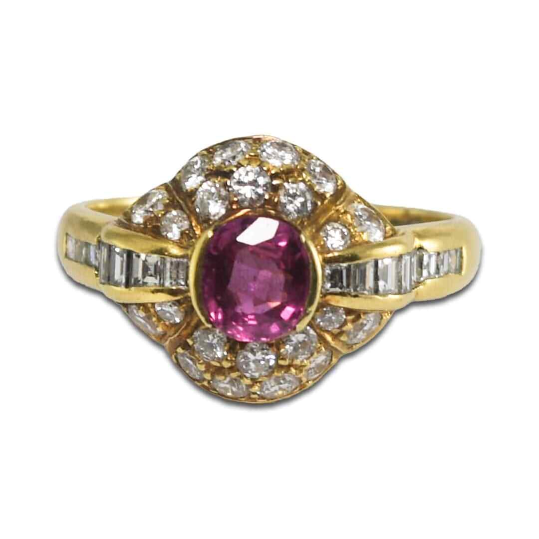 18K Yellow Gold Cluster Ring with Oval Ruby and Diamonds: 18K Yellow Gold Cluster Ring with Oval Ruby and Diamonds This elegant cluster ring is crafted from 18-karat yellow gold and features a central oval-shaped natural ruby measuring approximately 5.5 x 5 