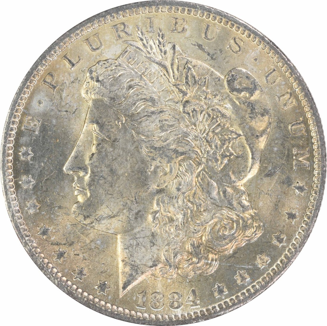1884 O Morgan Silver Dollar $1 Uncirculated Silver Coin: 1884 O Morgan Silver Dollar $1 Uncirculated Silver Coin 1884-O Morgan Silver Dollar in uncirculated, pre-owned condition. This uncertified silver $1 coin is identified as KM 110 and graded MS60. Speci