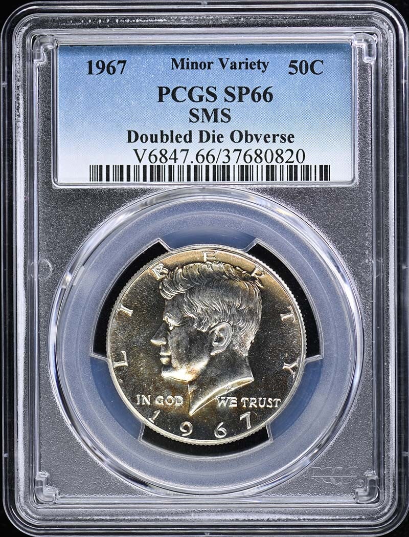 1967 Kennedy Half Dollar Type 2 Silver Clad PCGS SP66: 1967 Kennedy Half Dollar Type 2 Silver Clad PCGS SP66 This 1967 Kennedy Half Dollar is a stunning example of a Type 2 silver clad coin, graded SP66 by PCGS. It features a beautiful uncirculated finish