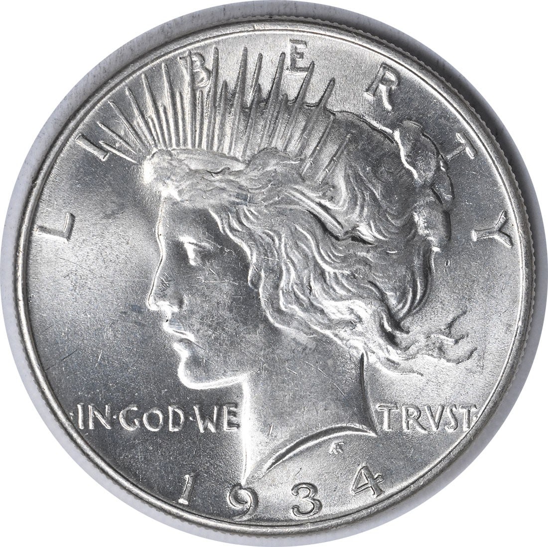 1934 Uncertified Peace Dollar Silver $1 MS63 Uncirculated: 1934 Uncertified Peace Dollar Silver $1 MS63 Uncirculated 1934 Peace Silver Dollar in uncirculated, choice BU condition. This uncertified pre-owned coin is composed of silver and identified as a $1 de