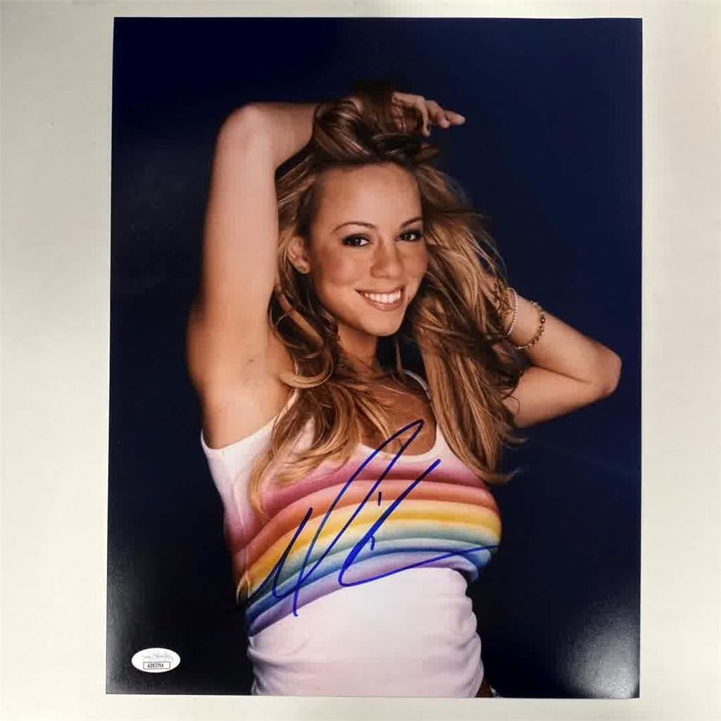Mariah Carey Autographed 11x14 Photograph Authenticated by JSA: Mariah Carey Autographed 11x14 Photograph Authenticated by JSA This is an original 11x14 photograph signed by Mariah Carey, authenticated by James Spence Authentication (JSA). The item is pre-owned an