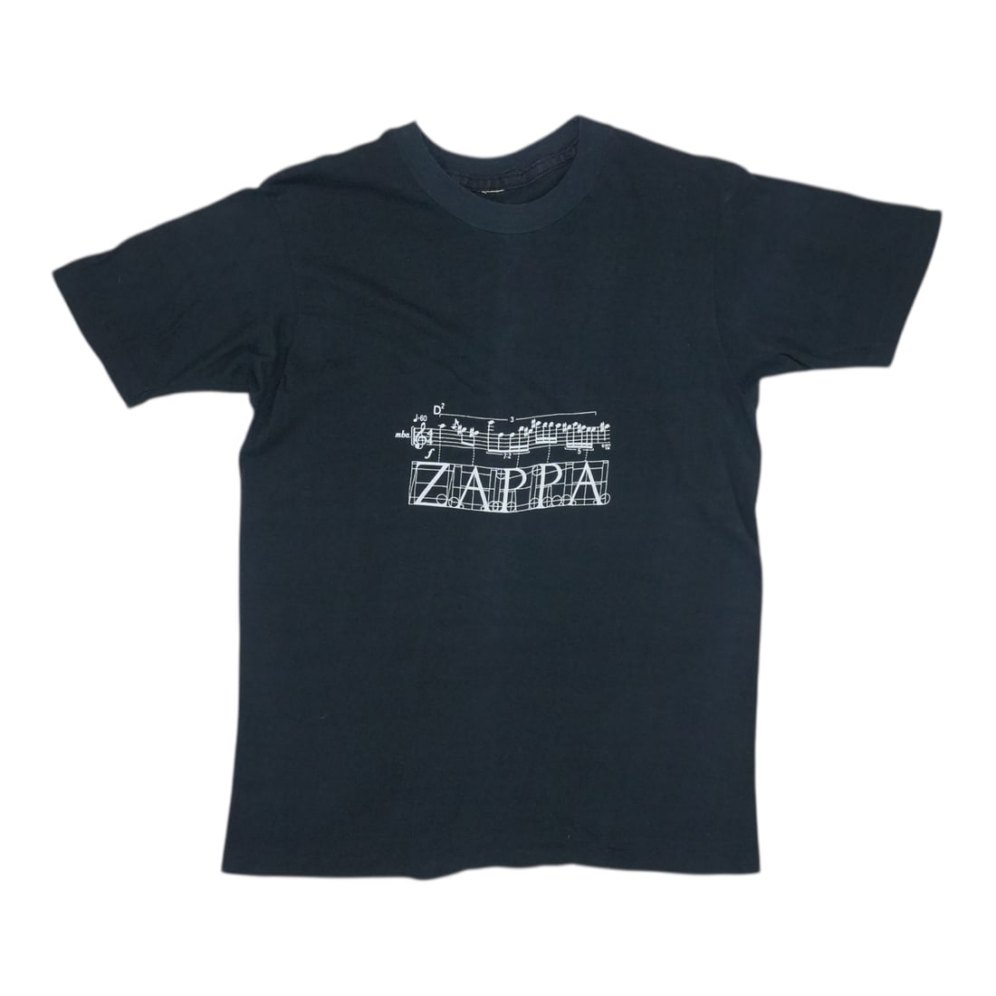 Vintage 1977 Frank Zappa Black Poly Cotton Graphic T-Shirt: Vintage 1977 Frank Zappa Black Poly Cotton Graphic T-Shirt This is an original vintage 1977 Frank Zappa "We Don't Mess Around" shirt, featuring front and back graphics. The shirt is made from a 50/50 