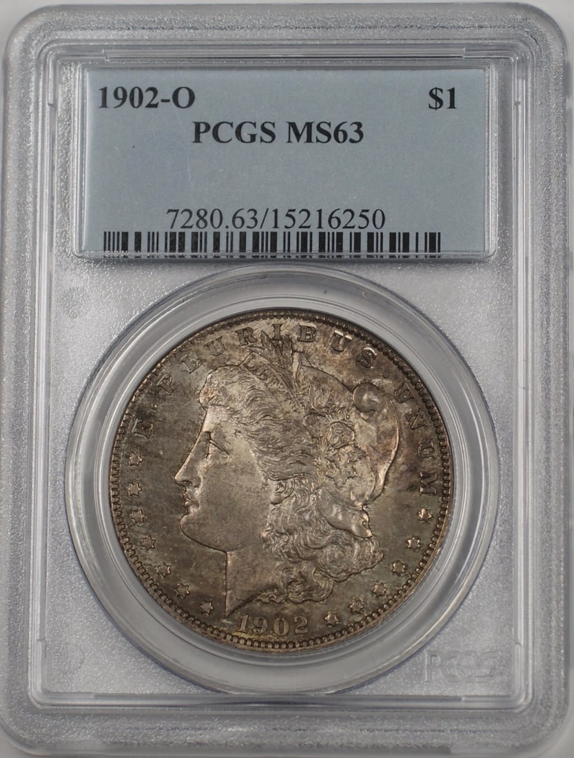 PCGS MS63 1902-O Morgan Silver Dollar Toned Uncirculated New Orleans: PCGS MS63 1902-O Morgan Silver Dollar Toned Uncirculated New Orleans This 1902-O Morgan Silver Dollar is certified by PCGS with a grade of MS 63. Struck in New Orleans, this uncirculated $1 coin featu