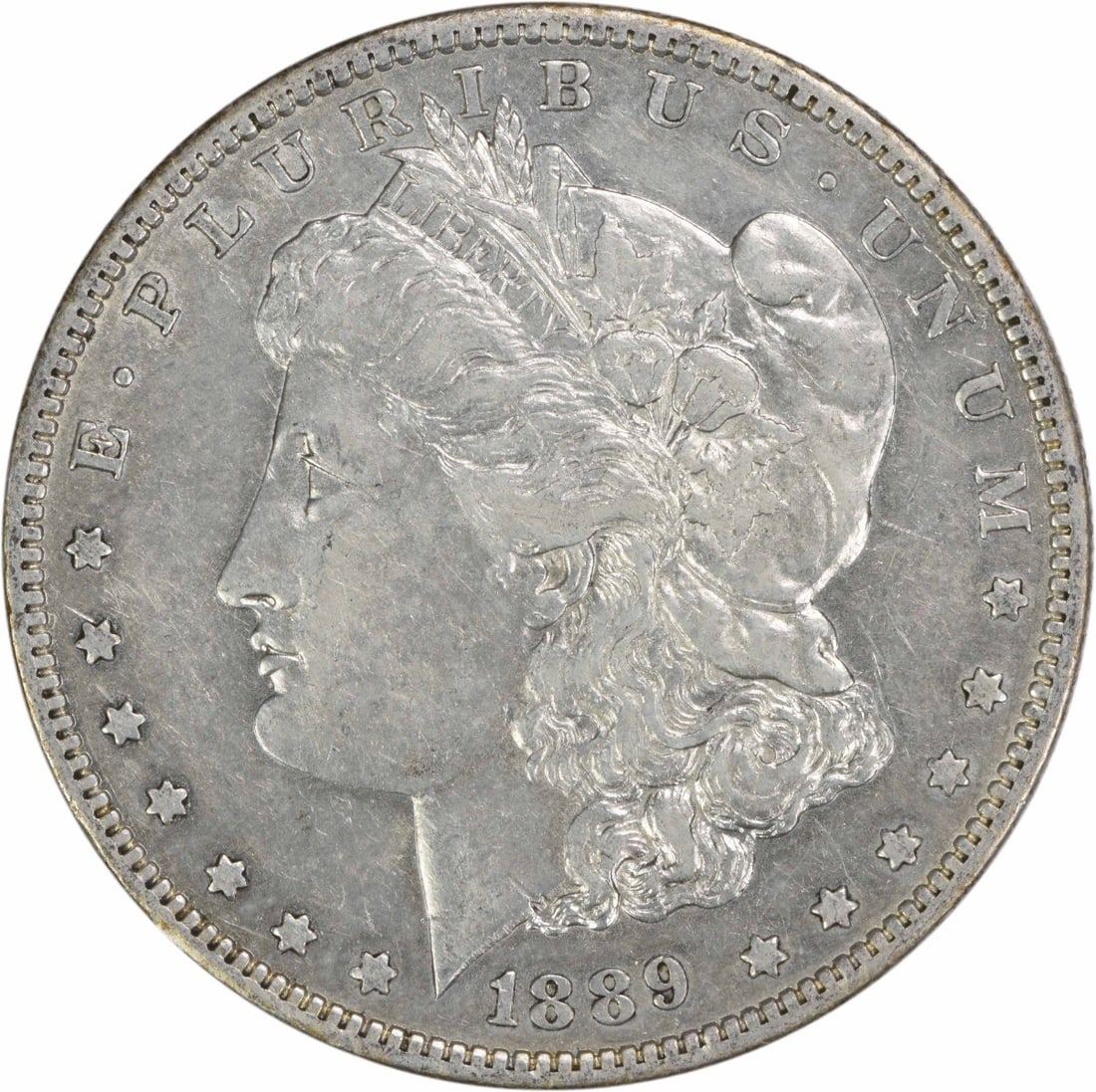 Morgan Dollar 1889 O 90 Percent Silver Extra Fine Uncertified US Coin: Morgan Dollar 1889 O 90 Percent Silver Extra Fine Uncertified US Coin This 1889-O Morgan Silver Dollar is a circulated coin from the New Orleans Mint, featuring the iconic design by George T. Morgan. 
