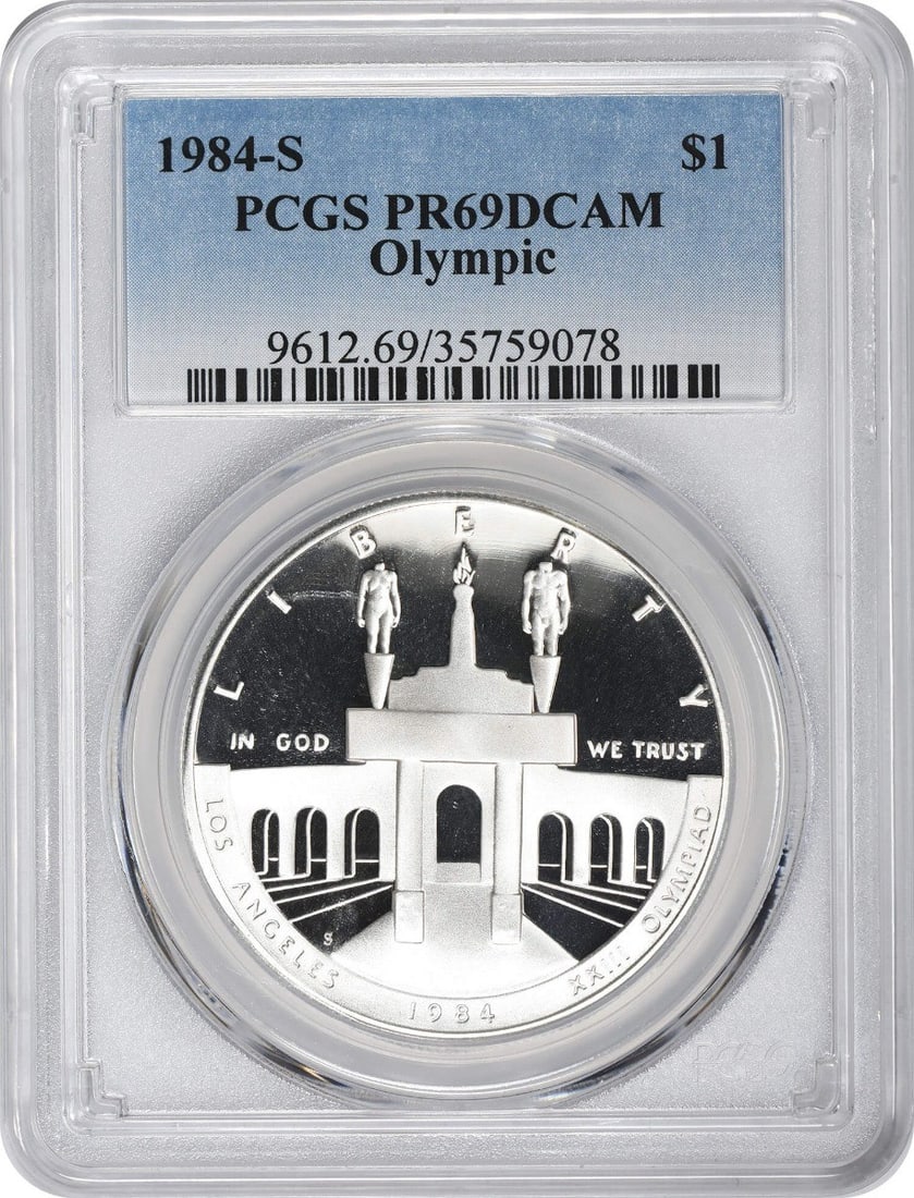 PCGS PR69DCAM 1984-S Olympic Silver Dollar Commemorative Proof: PCGS PR69DCAM 1984-S Olympic Silver Dollar Commemorative Proof This 1984-S Olympic Silver Commemorative Dollar is a PCGS-certified proof coin graded PR69DCAM (Proof 69 Deep Cameo). It is an uncirculat