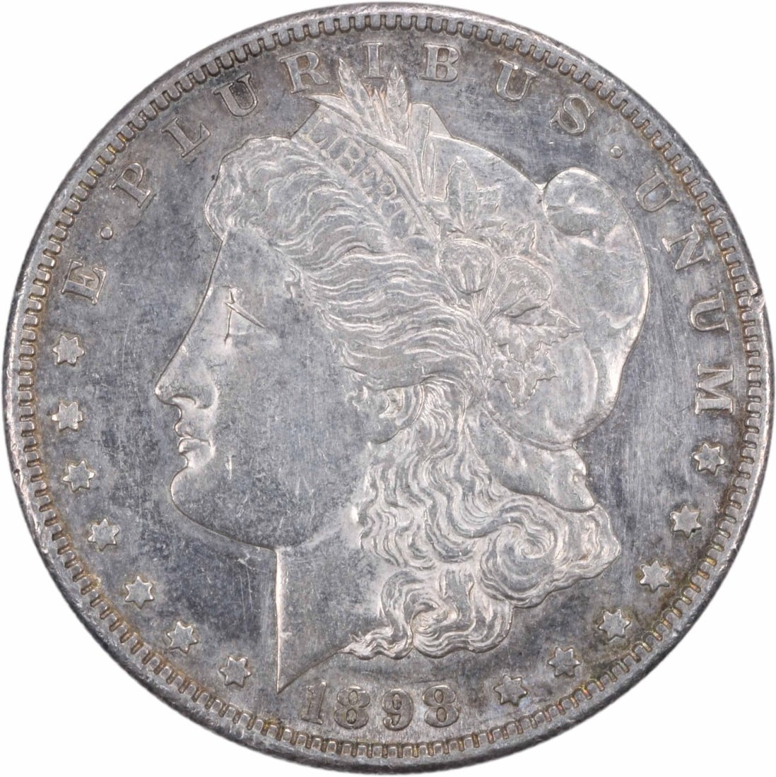 1898-S Morgan Silver Dollar AU Uncertified 90% Silver San Francisco: 1898-S Morgan Silver Dollar AU Uncertified 90% Silver San Francisco This 1898-S Morgan Silver Dollar is a remarkable piece for collectors, showcasing the artistry of designer George T. Morgan. Struck 