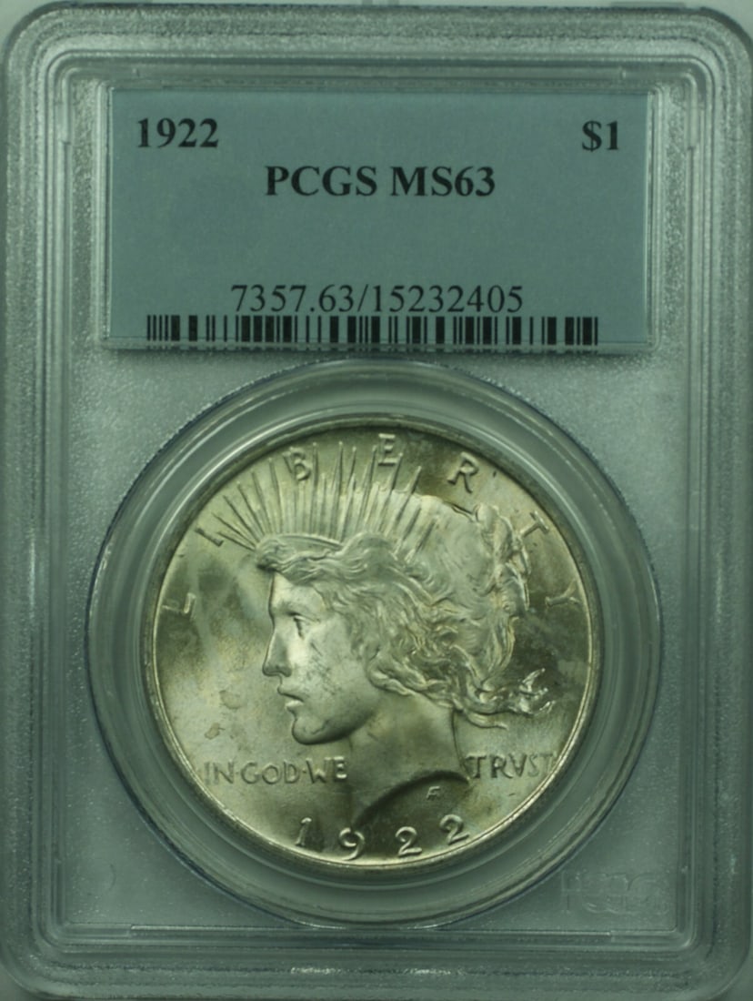 PCGS MS63 Graded 1922 Peace Silver Dollar United States $1 Coin: PCGS MS63 Graded 1922 Peace Silver Dollar United States $1 Coin This is a 1922 Peace Silver Dollar $1 coin graded MS-63 by PCGS. Struck in silver with a fineness of 0.9, this uncirculated coin was min