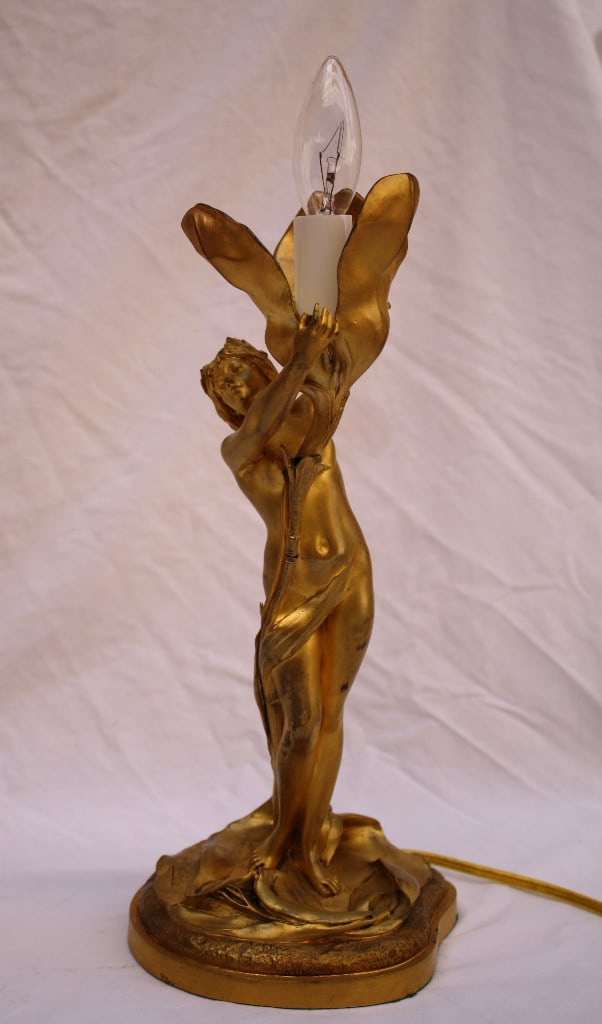 19th Century French Art Nouveau Dore Bronze Lamp by E. Lelievre: 19th Century French Art Nouveau Dore Bronze Lamp by E. Lelievre This exquisite 19th century French Art Nouveau lamp features a stunning design of a nude young woman gracefully holding a tulip. Crafted