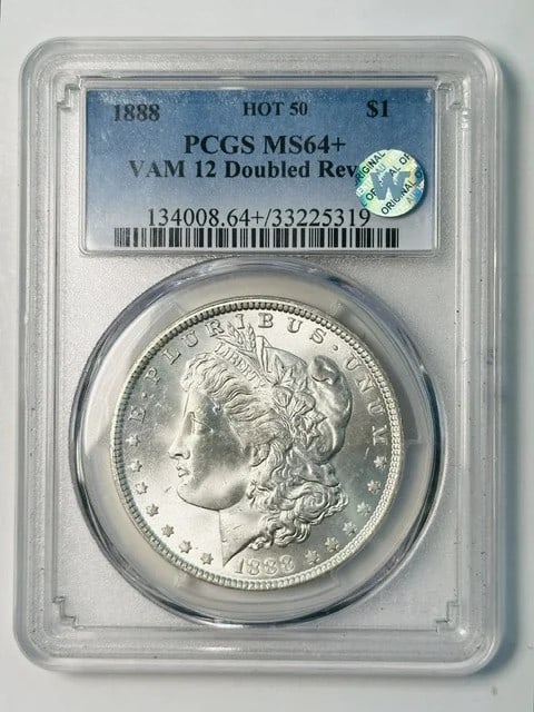PCGS MS-64+ 1888 Morgan Silver Dollar VAM 12 Doubled Reverse: PCGS MS-64+ 1888 Morgan Silver Dollar VAM 12 Doubled Reverse 1888 Morgan Silver Dollar certified by PCGS as MS-64+ and identified as VAM 12 with a Doubled Reverse. This pre-owned coin is described as 