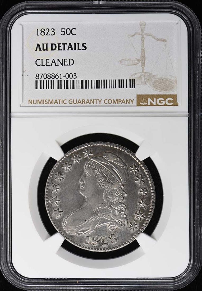 1823 Capped Bust Half Dollar 50C Lettered Edge NGC AU Details: 1823 Capped Bust Half Dollar 50C Lettered Edge NGC AU Details 1823 Capped Bust Half Dollar certified by NGC and graded AU Details. This pre-owned United States coin features a lettered edge and is lis