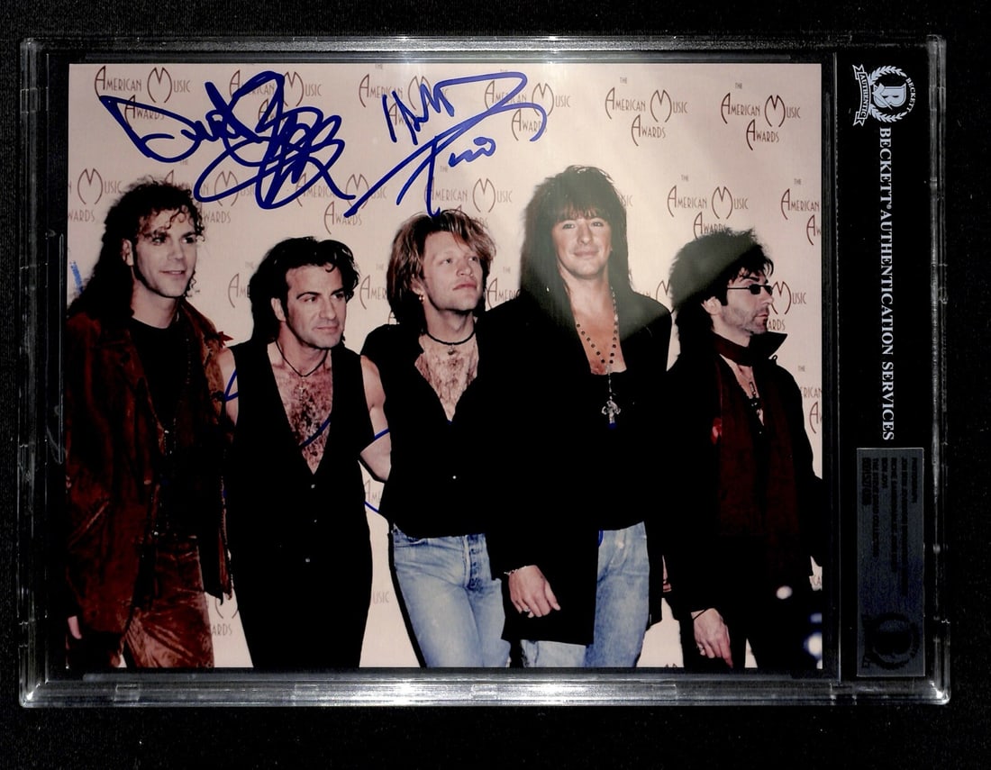 Bon Jovi Band Signed 8x10 Photo with Beckett Authentication: Bon Jovi Band Signed 8x10 Photo with Beckett Authentication This is an original 8x10 photograph autographed by the iconic band Bon Jovi, featuring signatures from Jon Bon Jovi, David Bryan, Tico Torre