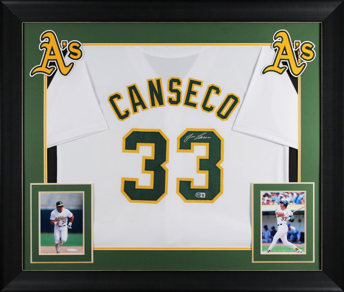 Framed Oakland Athletics Jersey Signed by Jose Canseco BAS Witnessed: Framed Oakland Athletics Jersey Signed by Jose Canseco BAS Witnessed This professionally framed white pro-style jersey has been personally signed by Jose Canseco of the Oakland Athletics. The autograp