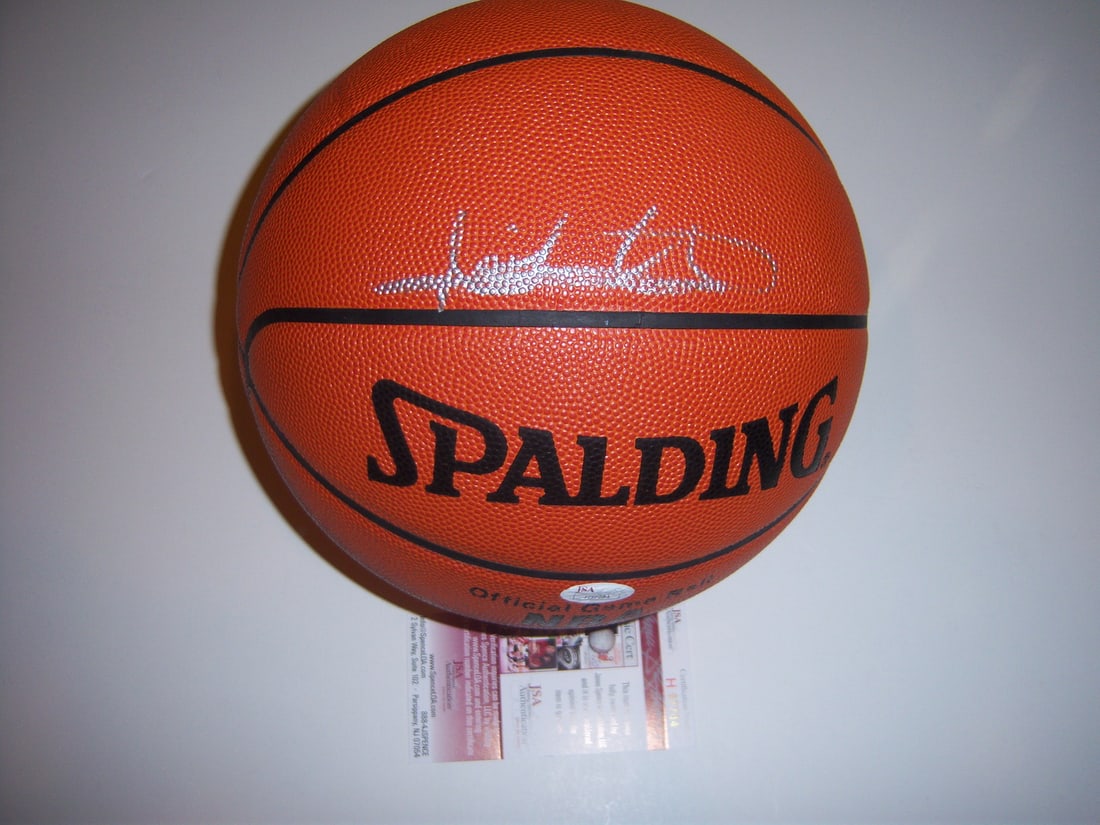 Detroit Pistons Spalding basketball signed by Isiah Thomas (1 of 2)