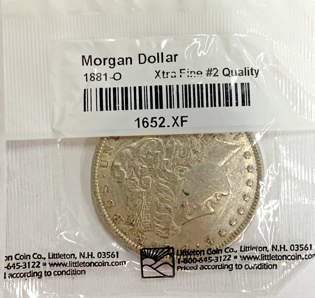 Morgan Dollar 1881 New Orleans Silver Coin Circulated Example: Morgan Dollar 1881 New Orleans Silver Coin Circulated Example This 1881-O Morgan Silver Dollar is a circulated coin minted in New Orleans. Composed of silver, it is classified as ungraded and uncertif