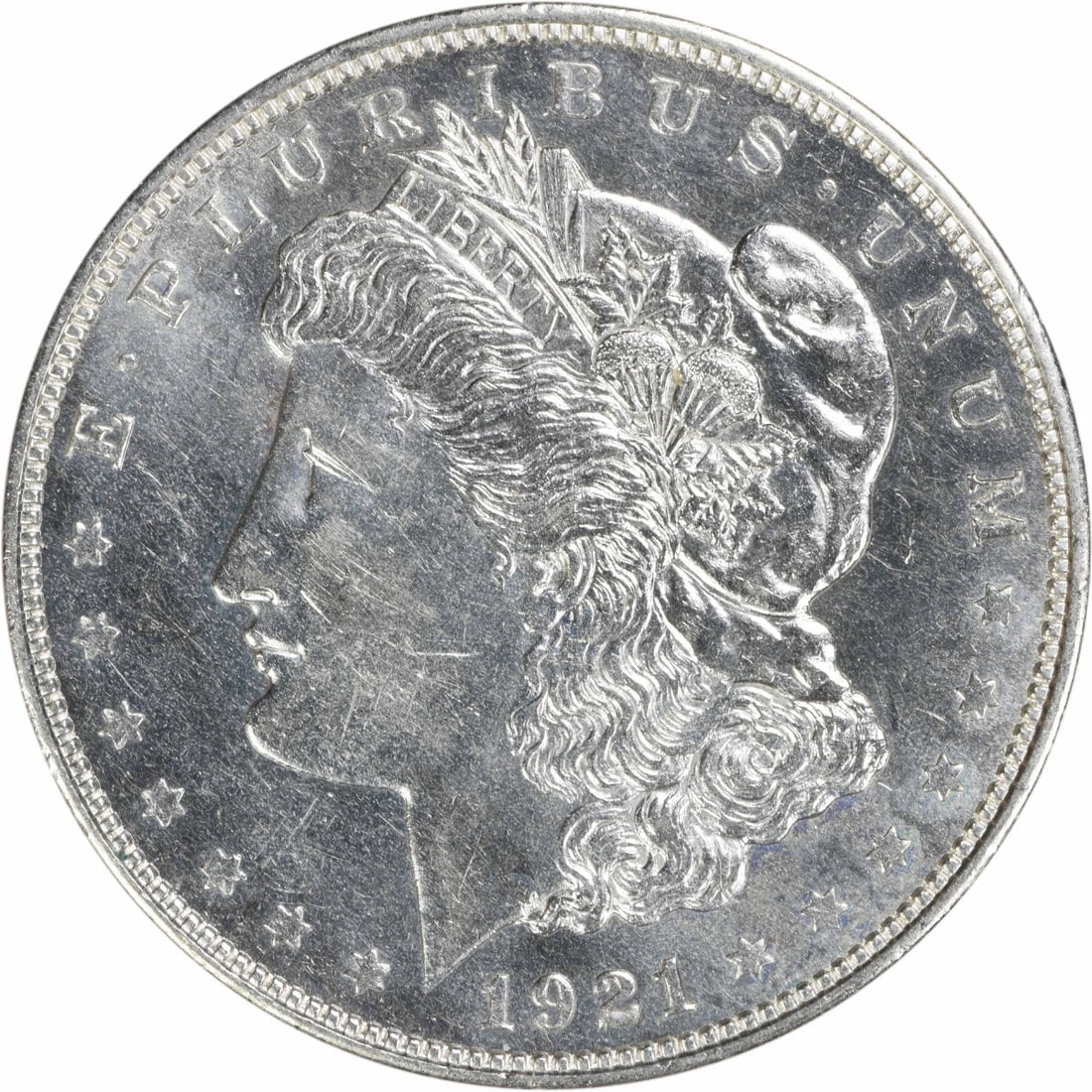 1921 Denver Mint Morgan Silver Dollar Brilliant Uncirculated Uncertified: 1921 Denver Mint Morgan Silver Dollar Brilliant Uncirculated Uncertified This 1921-D Morgan Silver Dollar is an uncirculated example from the Denver Mint. Featuring the popular Morgan design, it is co